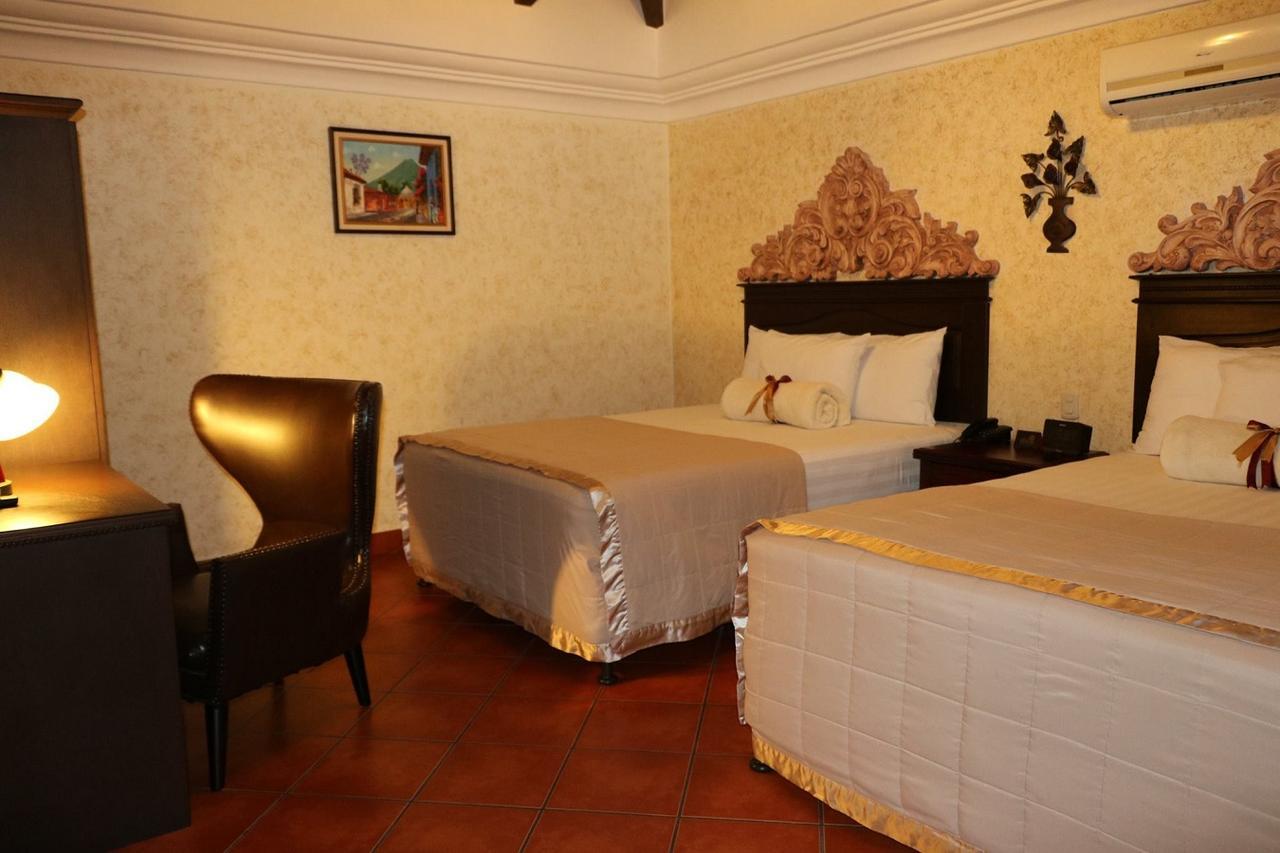 Hotel Genessis Antigua Bagian luar foto