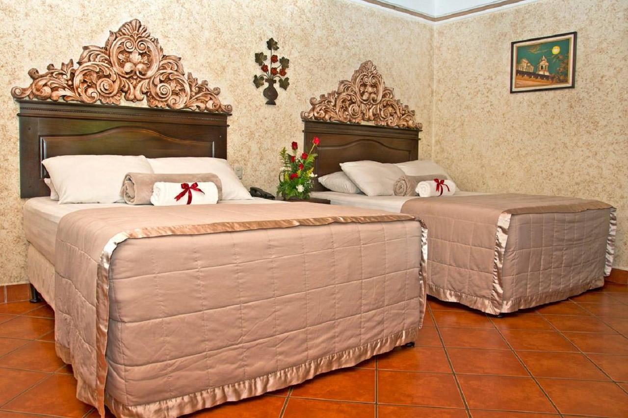 Hotel Genessis Antigua Bagian luar foto